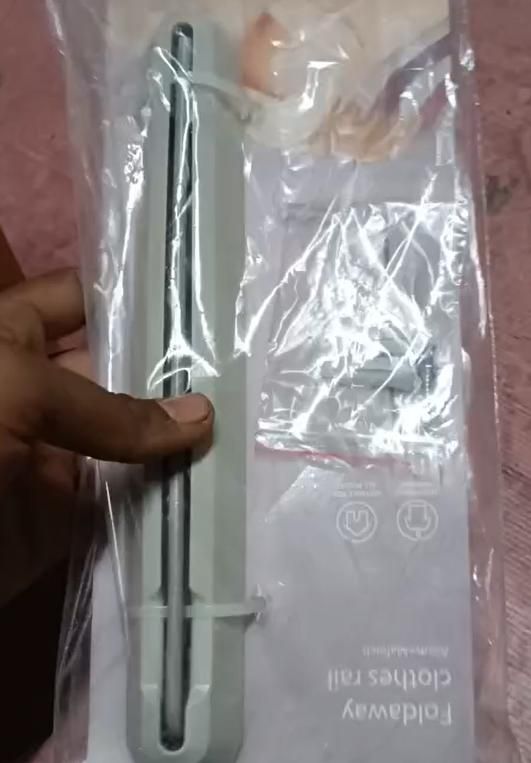 Compact Folding Rail Holder With 5 Hangers Capacity